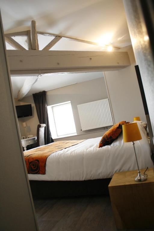 Logis Hostellerie De L'Abbaye Celles-sur-Belle Rom bilde